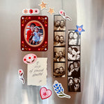 Decorative collage with family photos and decorative elements on a textured surface